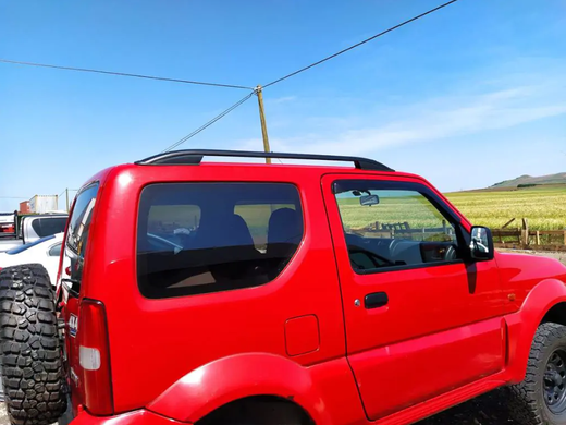 Рейлінги SUZUKI JIMNY 1998-2018 цільнолиті чорні SKYPORT